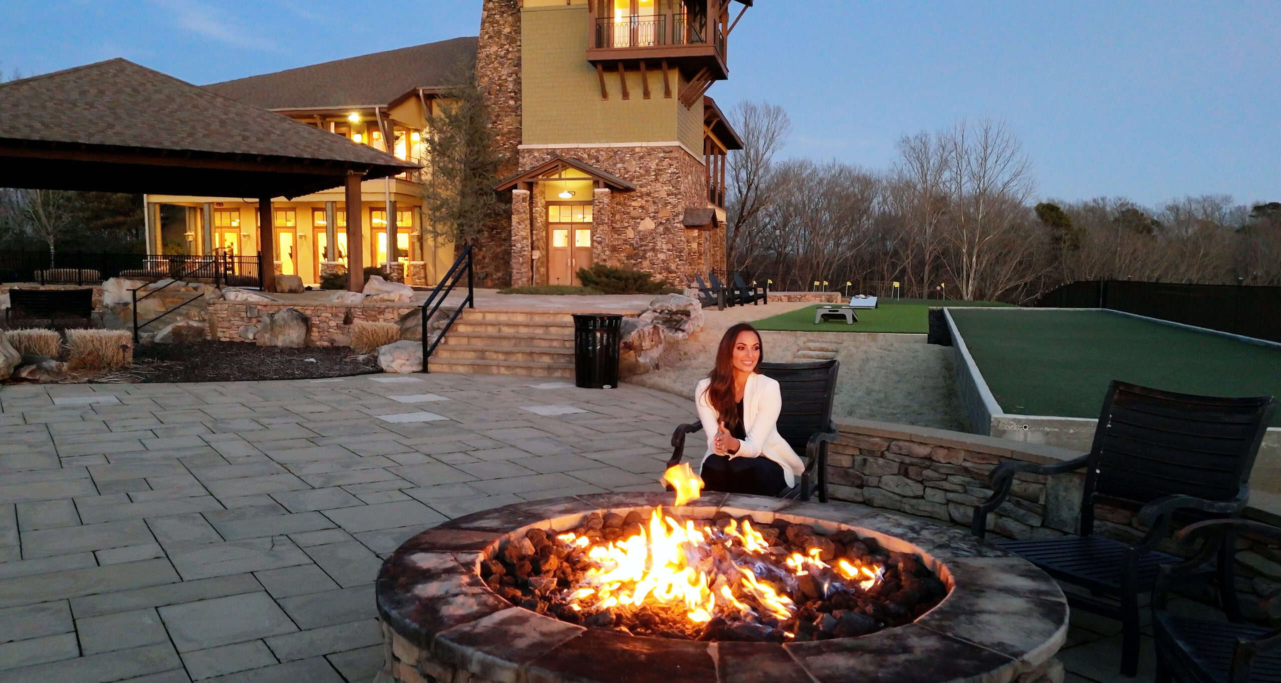 Tennessee lakefront community clubhouse with fire pit and outdoor lounge