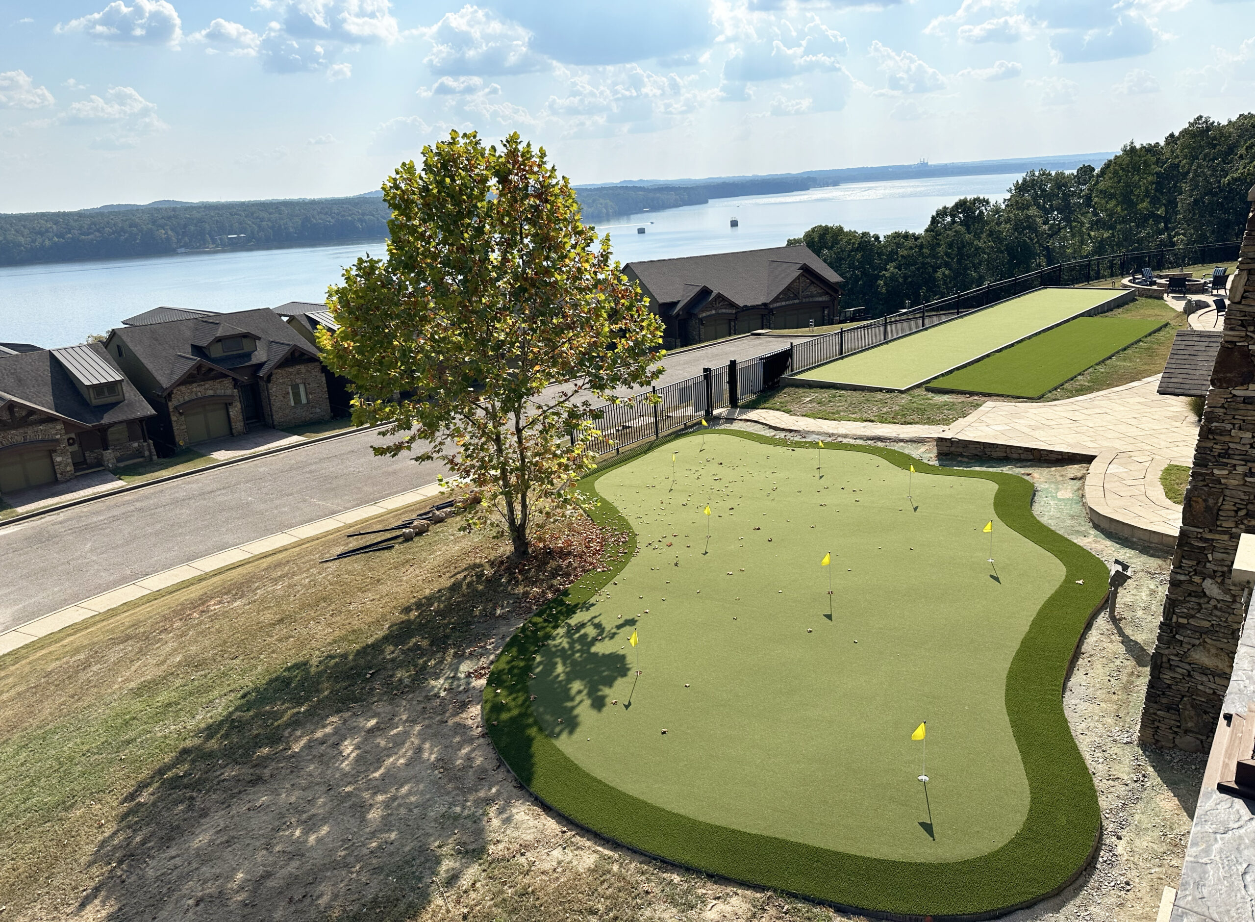 Tennessee gated lake community lifestyle amenities with golf practice area
